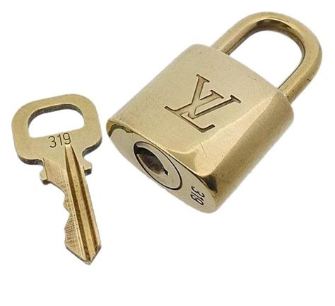 louis vuitton lock and key fake|authentic Louis Vuitton lock key.